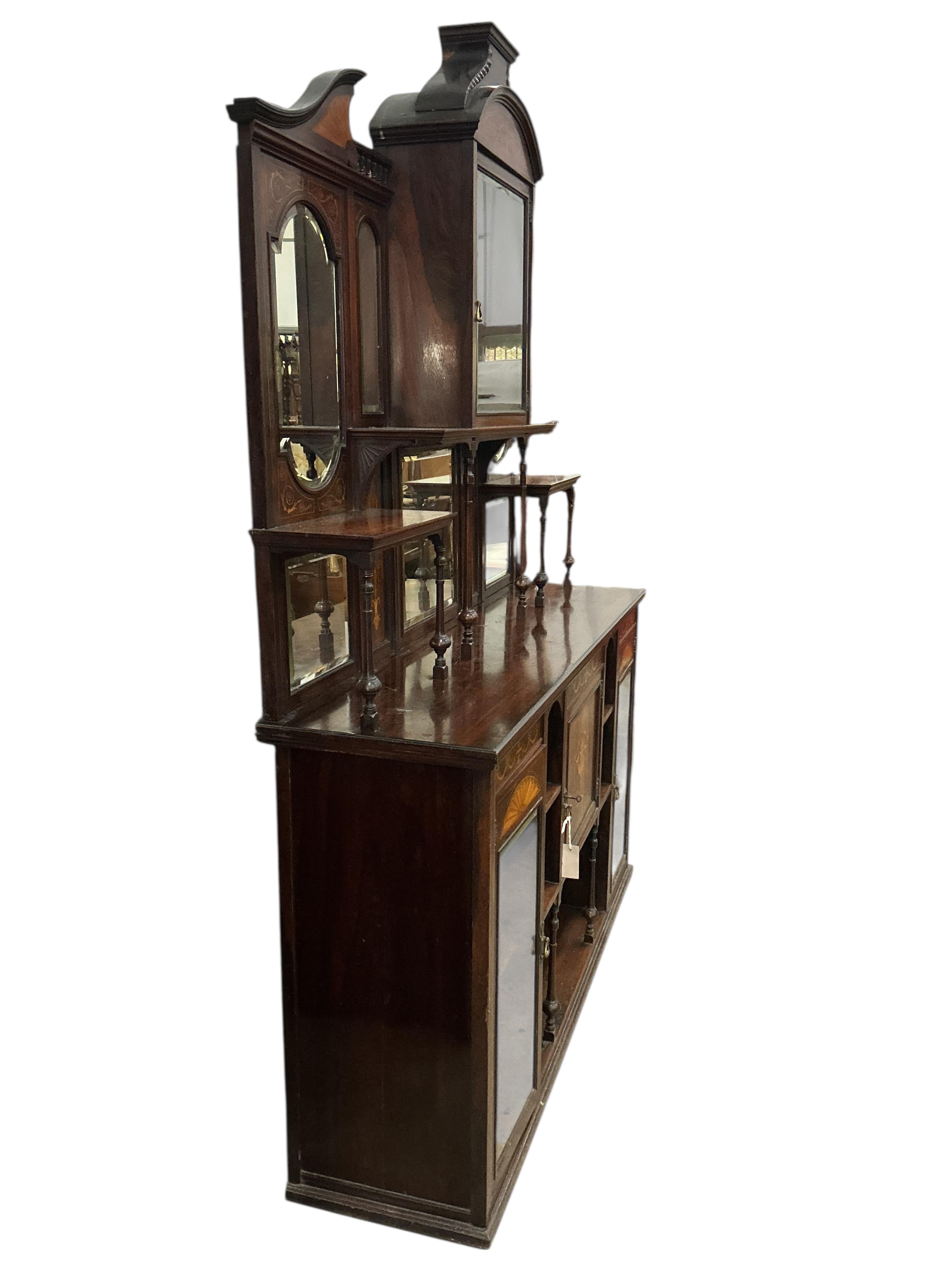 An Edwardian marquetry inlaid rosewood side cabinet, width 153cm, depth 41cm, height 208cm
